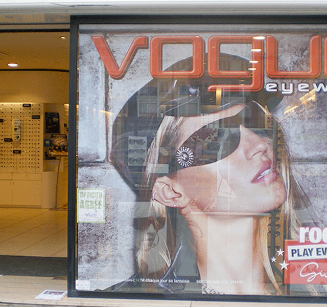 magasin vitrine vitrophanie impression microperfore sur verre